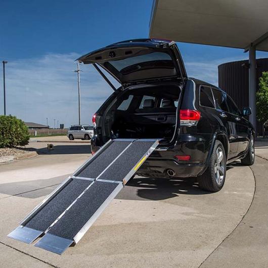 Portable ramp attached to SUV trunk space