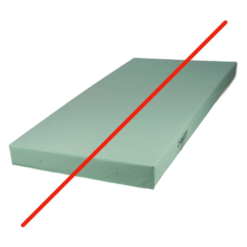 green mattress with a big red line slashing through it