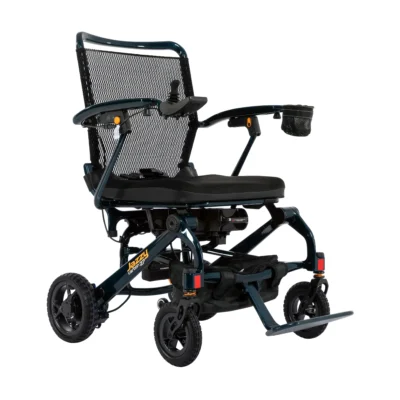 A compact, dark teal Jazzy Carbon 27 power wheelchair featuring a mesh back, joystick control on the armrest, and a detachable cup holder.