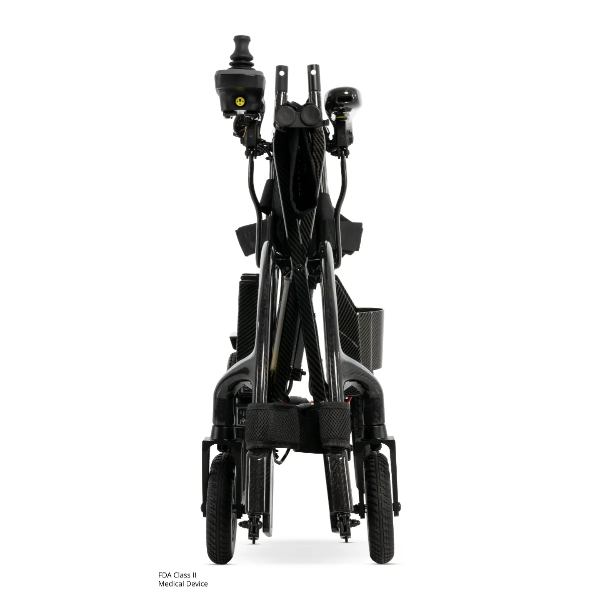 The Jazzy Carbon 27x folding power chair stands upright, viewed from the front, showcasing its compact, folded design and carbon fiber material.