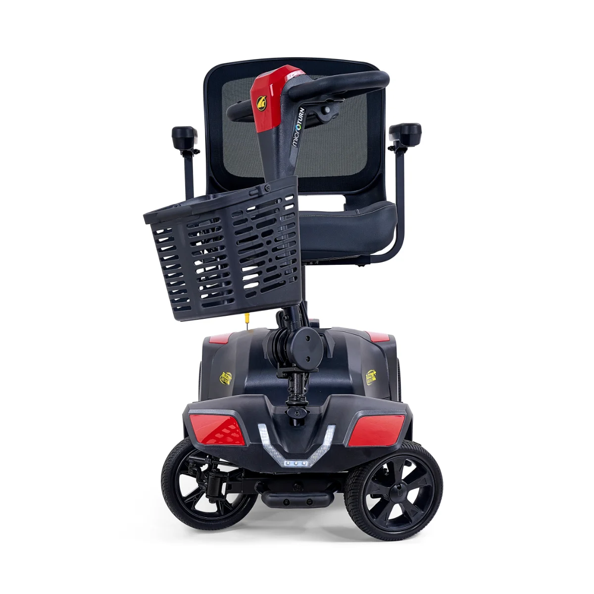 A front view of the Buzzaround XL Plus mobility scooter, featuring a black chassis, red accents, a mesh seat, and a large front basket.