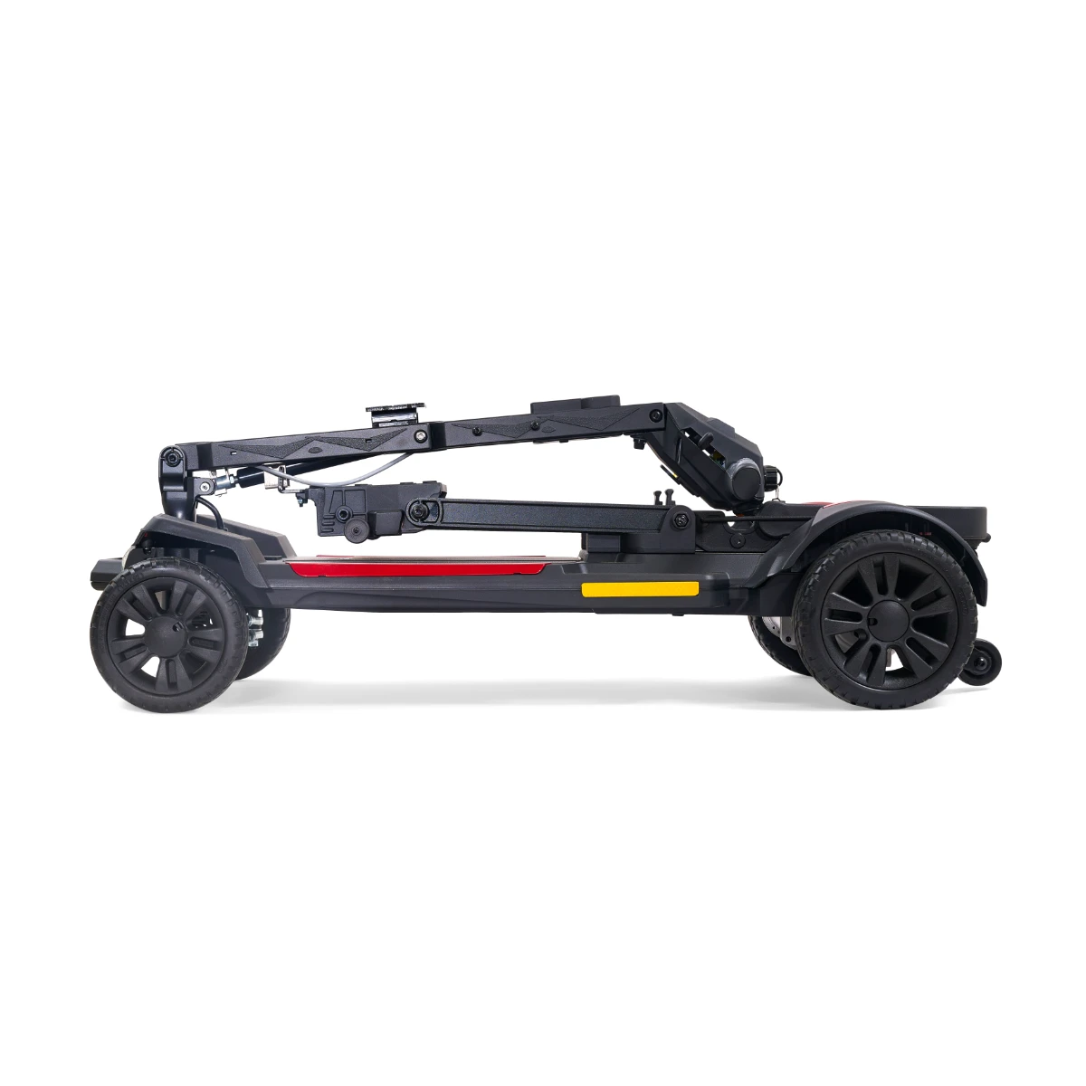 A black Golden Buzzaround Carry-On mobility scooter shown folded for compact storage, with red and yellow accents visible on the side panel.