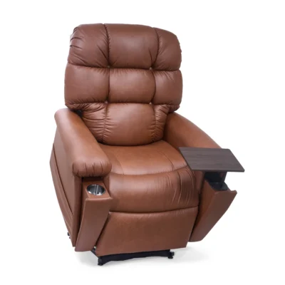 A brown leather lift recliner chair with a padded back, a chrome cup holder on the left, and a dark wood swivel table on the right armrest.